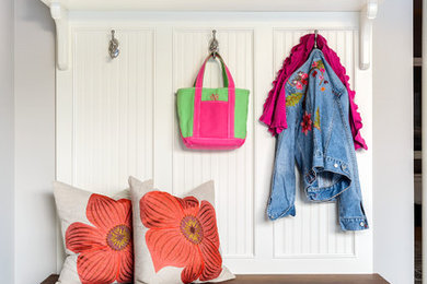 Mudroom - small traditional ceramic tile mudroom idea in New York with gray walls