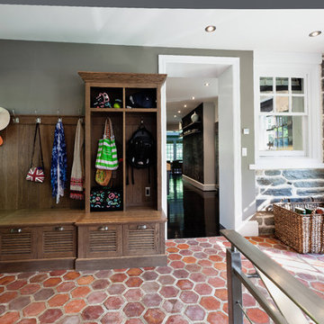 Mudroom, French tile floor, built in white oak cabinets