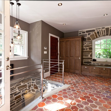 Mudroom, French tile floor, built in white oak cabinets