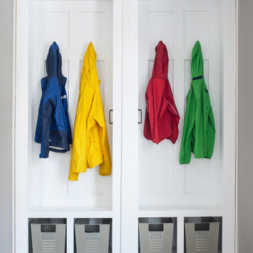 Mudroom/laundry room/office/closet- A place for everything!  These lockers open