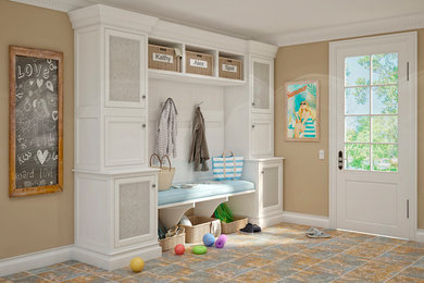 Example of a mid-sized classic ceramic tile and multicolored floor entryway design in New York with beige walls and a white front door