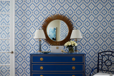 Example of a mid-sized transitional medium tone wood floor entryway design in Miami with blue walls and a white front door