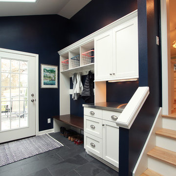 Navy Blue Mudroom off Kitchen with Ample Coat Storage