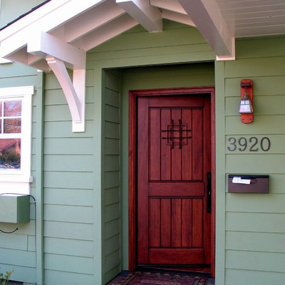 Entryway - craftsman entryway idea in San Francisco with a dark wood front door