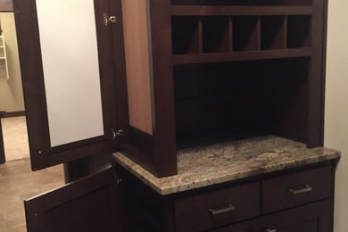 Example of a small arts and crafts mudroom design in Other with beige walls