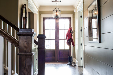 Foto de hall campestre grande con paredes beige, suelo de madera oscura, puerta doble y puerta de vidrio