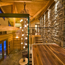 Rustic Entry by Sticks + Stones Design Group Inc.