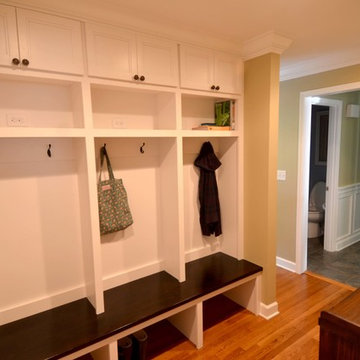 One useless space turns into two highly functional spaces; Mud Room & Office
