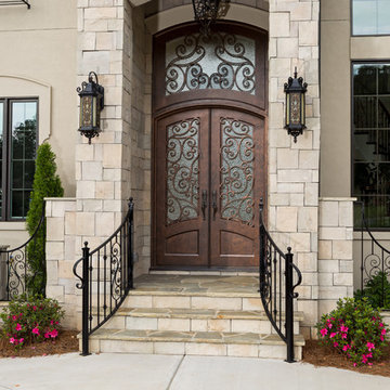 Make a Statement with a Ornate Double Iron Doors