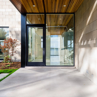 Entryway - contemporary entryway idea in Ottawa with a glass front door
