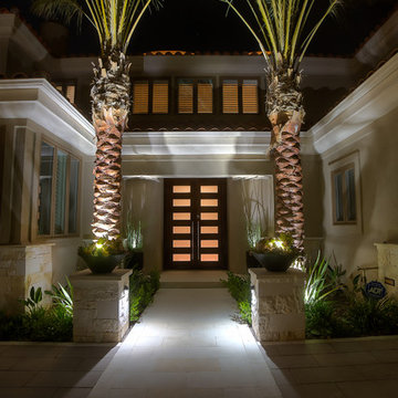 Palm-Lined Grand Entryway with Limestone Pavers