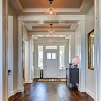 Entryway - traditional entryway idea in Salt Lake City with white walls and a white front door