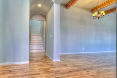 Example of a large classic foyer design in Albuquerque with blue walls