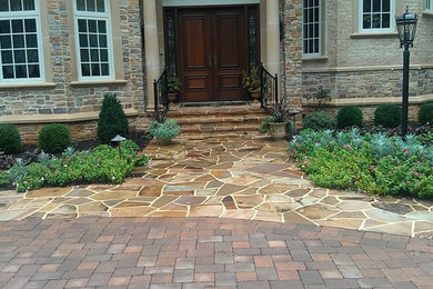 Inspiration for a timeless double front door remodel in Baltimore with a dark wood front door