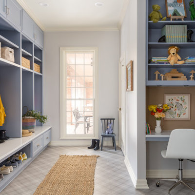 Mudroom - transitional multicolored floor mudroom idea in Houston with gray walls