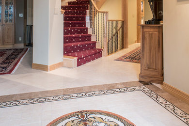 Example of a large eclectic foyer design in Denver