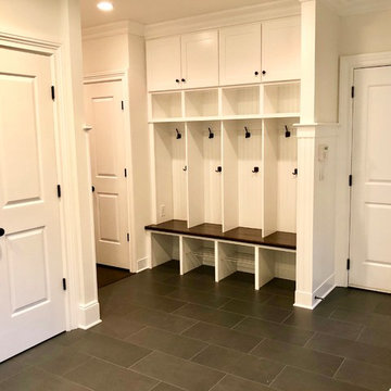 Porch Enclosed for Mudroom with Custom Bench and Cubbies.