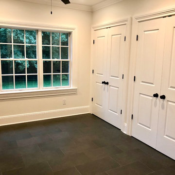 Porch Enclosed for Mudroom with Custom Bench and Cubbies.