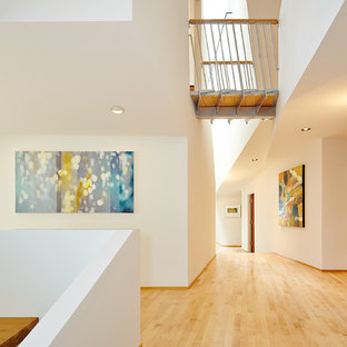 Trendy entryway photo in Seattle with white walls