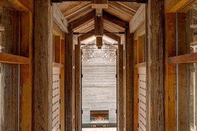 Inspiration for a craftsman medium tone wood floor entryway remodel in Salt Lake City
