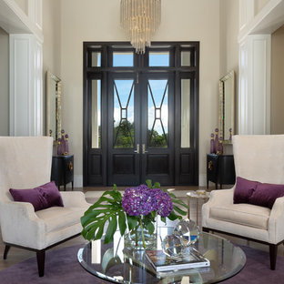 Ispirazione per una porta d'ingresso design di medie dimensioni con pareti beige, parquet scuro, una porta a due ante, una porta in vetro e pavimento marrone