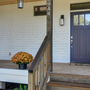 Quixotic Plum Entry with Dark Wood Stained Porch