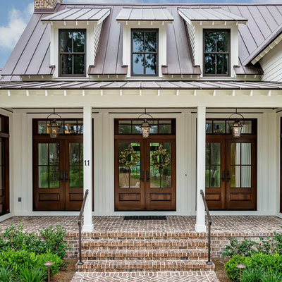 Large country entryway photo in Atlanta with a dark wood front door
