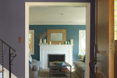 Photo of a traditional entrance in San Francisco with purple walls, medium hardwood flooring, a single front door and a dark wood front door.