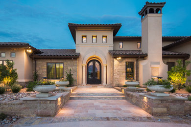 This is an example of a mediterranean entrance in Austin.