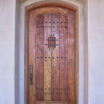 Rustic Arched Top Carved Door with Speakeasy