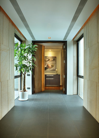 Contemporary Entrance by Design Point Interiors Pte Ltd