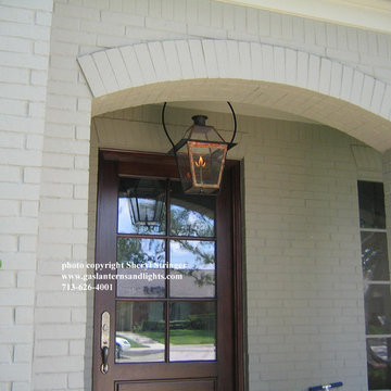 Sheryl's New Orleans Style Gas Lantern with Glass Top Hanging by Steel Yoke