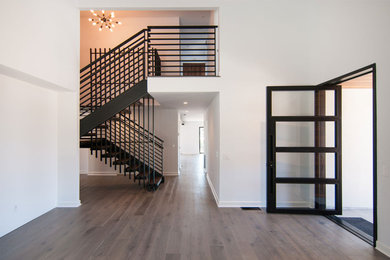 Steel Pivot Door and Steel Staircase - Stevens Residence