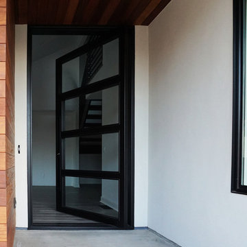 Steel Pivot Door - Stevens Residence