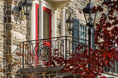 Inspiration for a timeless front door remodel in Philadelphia with a red front door