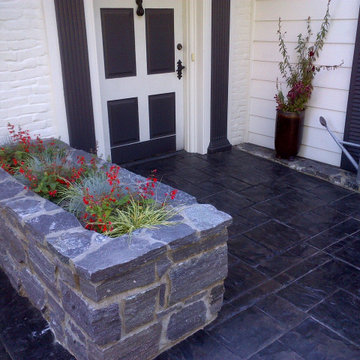 Stone walls and stamped concrete entry