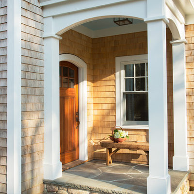 Single front door - traditional light wood floor single front door idea in Boston