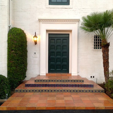 Terra Cotta tile and hand painted accent tile Installation