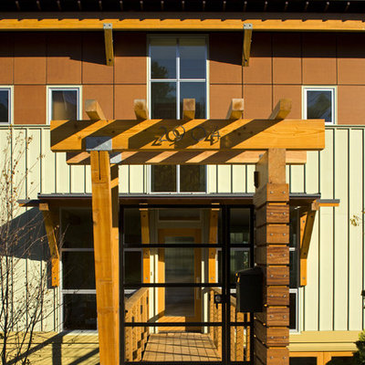 Entryway - contemporary entryway idea in Seattle with a glass front door