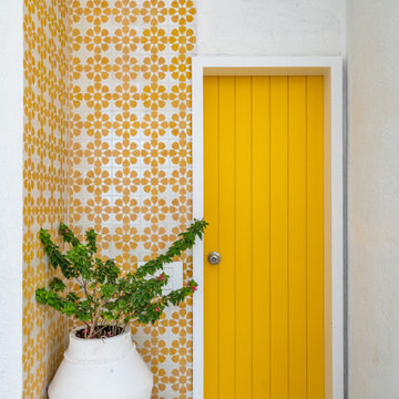 The yellow door pent house design by between walls pune