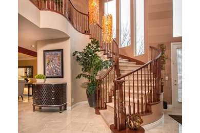 This dramatic staircase begged for dramatic lighting.  It wasn't easy but is now