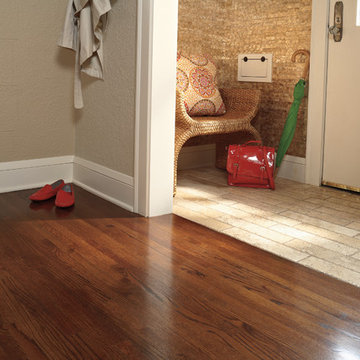Tile entry transitions to hardwood flooring