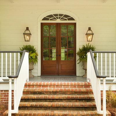 Inspiration for a timeless double front door remodel in Atlanta with a glass front door