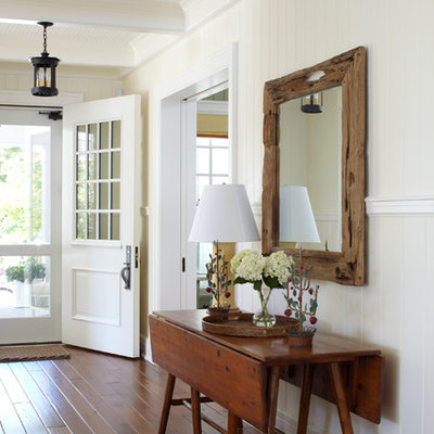 Single front door - traditional single front door idea in Other with a white front door