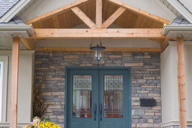 Inspiration for a large craftsman entryway remodel in Charlotte