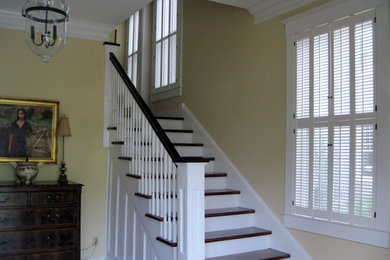 Traditional Stairwell Entry with Traditional Shutters