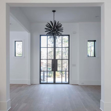 Transitional Family Home with Modern Elements Foyer