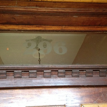 Transom window and millwork above the front door