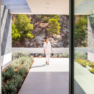 Trousdale Beverly Hills luxury home modern front entrance covered walkway & glas