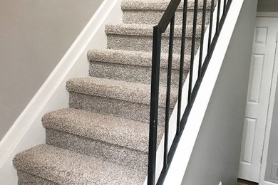 Example of a transitional staircase design in Detroit